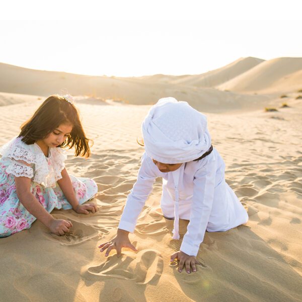 kids play in desert